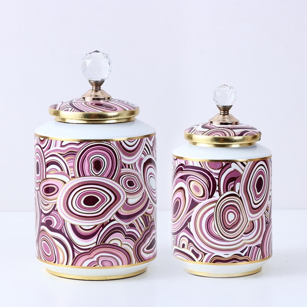Pink patterned ceramic decorative canisters with gold-tone trim